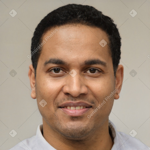 Joyful latino young-adult male with short  black hair and brown eyes