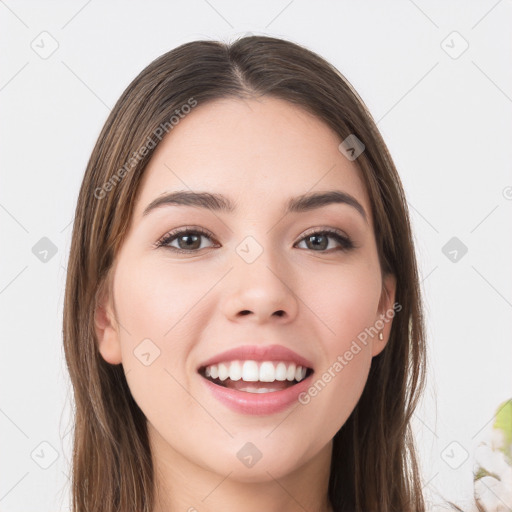 Joyful white young-adult female with long  brown hair and grey eyes