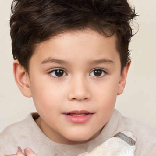 Joyful white child female with short  brown hair and brown eyes