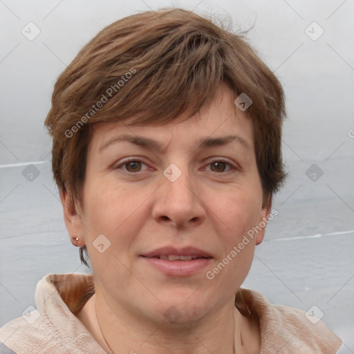 Joyful white adult female with short  brown hair and brown eyes