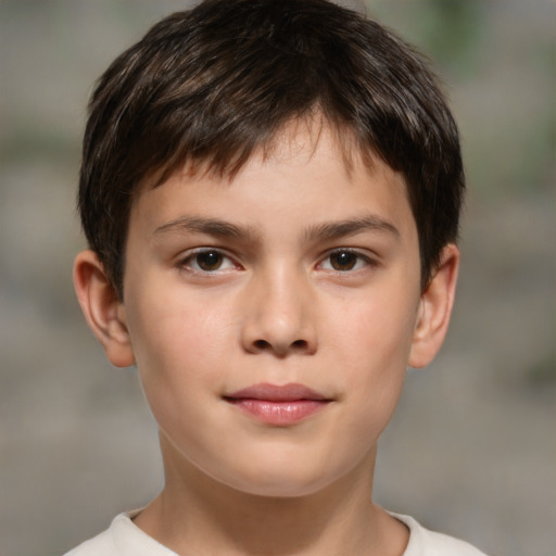 Joyful white child male with short  brown hair and brown eyes