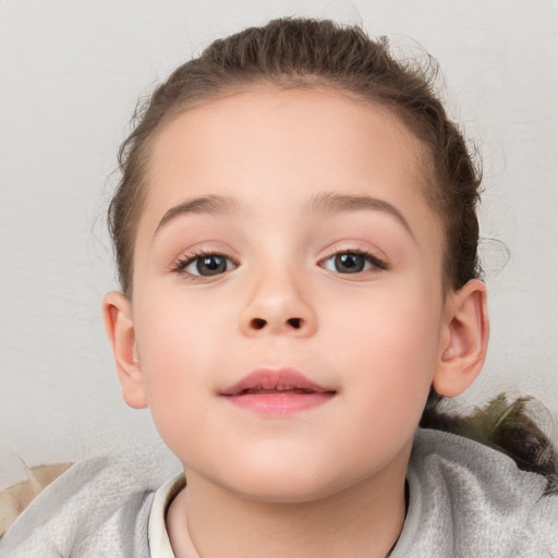 Neutral white child female with short  brown hair and brown eyes