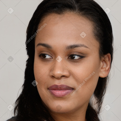 Joyful latino young-adult female with long  brown hair and brown eyes