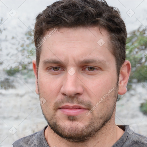 Neutral white young-adult male with short  brown hair and grey eyes