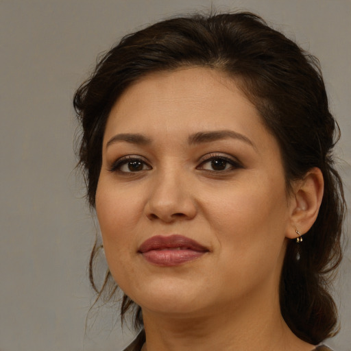 Joyful white young-adult female with medium  brown hair and brown eyes