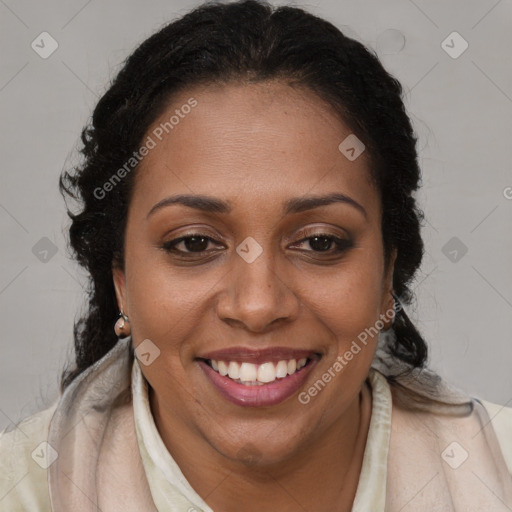 Joyful black young-adult female with long  brown hair and brown eyes