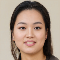 Joyful asian young-adult female with medium  brown hair and brown eyes