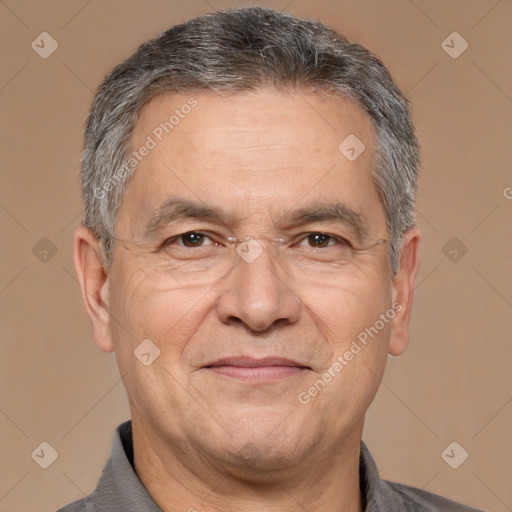 Joyful white middle-aged male with short  gray hair and brown eyes