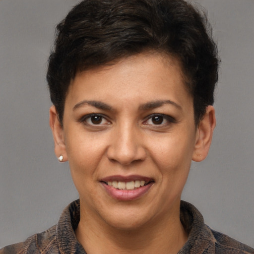 Joyful white young-adult female with short  brown hair and brown eyes