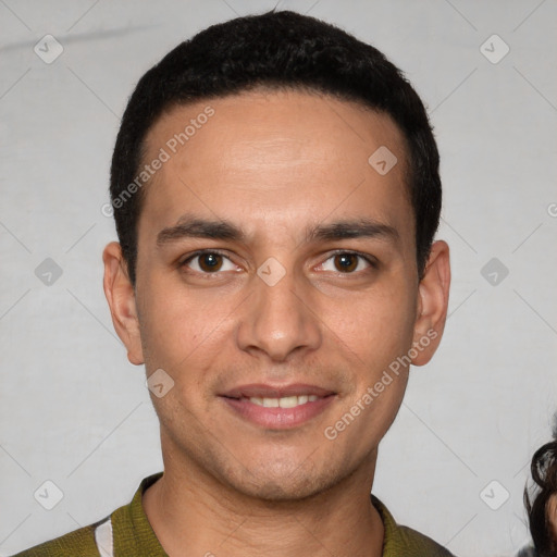 Joyful white young-adult male with short  black hair and brown eyes