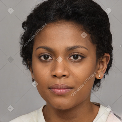 Joyful black young-adult female with medium  black hair and brown eyes