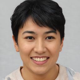 Joyful asian young-adult female with short  brown hair and brown eyes