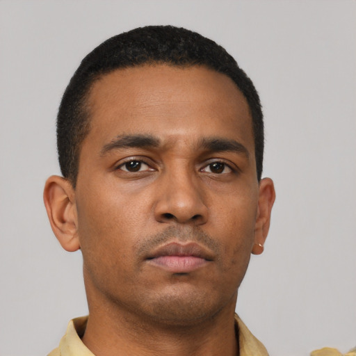 Neutral latino young-adult male with short  brown hair and brown eyes