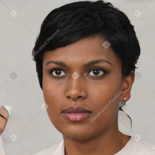 Neutral black young-adult female with short  black hair and brown eyes