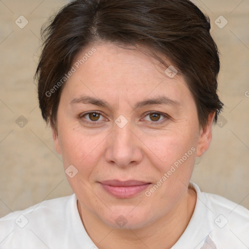 Joyful white adult female with short  brown hair and brown eyes