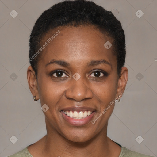 Joyful black young-adult female with short  black hair and brown eyes