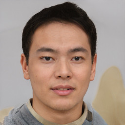 Neutral asian young-adult male with short  brown hair and brown eyes