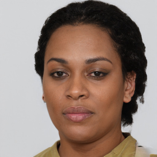 Neutral black young-adult female with short  black hair and brown eyes