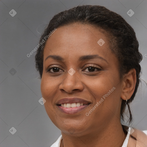 Joyful black young-adult female with medium  brown hair and brown eyes