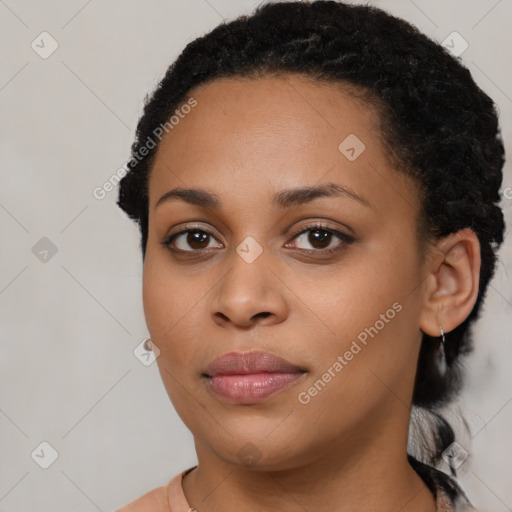 Joyful latino young-adult female with short  black hair and brown eyes