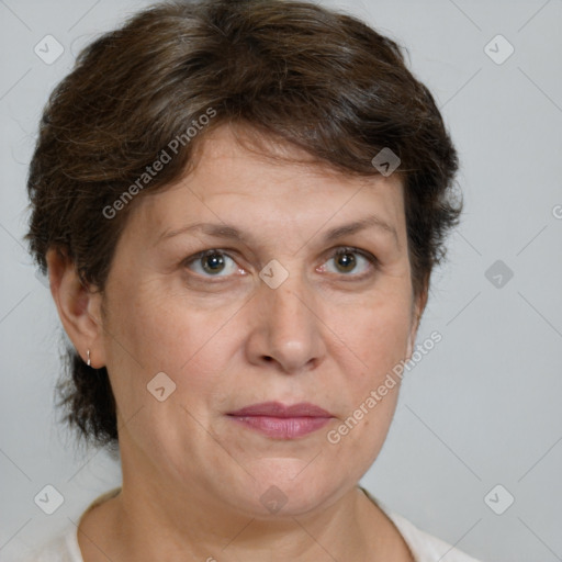 Joyful white adult female with short  brown hair and brown eyes