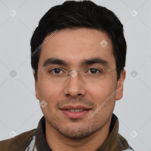 Joyful white young-adult male with short  black hair and brown eyes