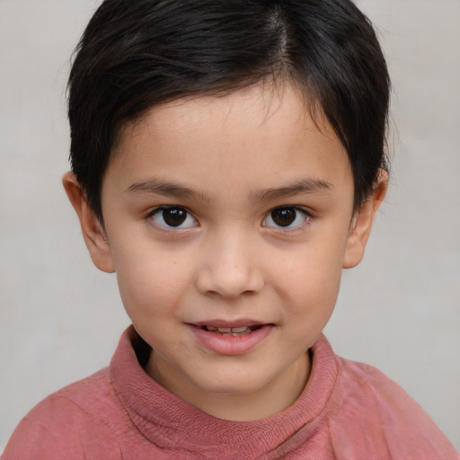 Joyful white child female with short  brown hair and brown eyes