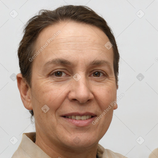 Joyful white adult female with short  brown hair and brown eyes