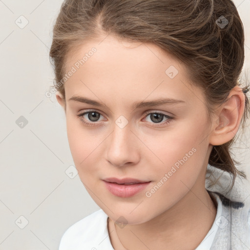 Joyful white child female with medium  brown hair and brown eyes