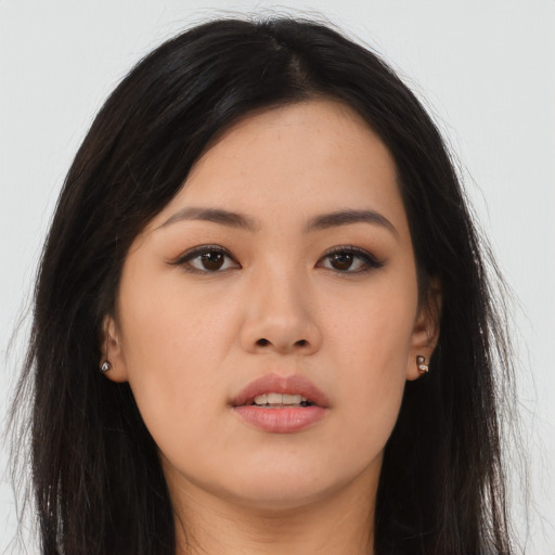 Neutral asian young-adult female with long  brown hair and brown eyes