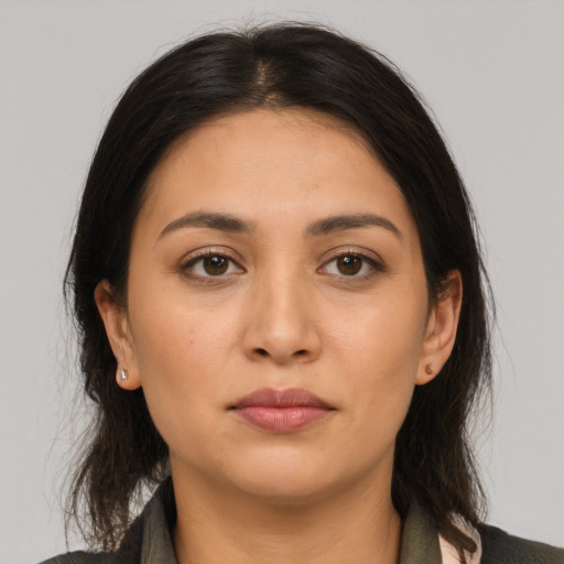 Neutral asian young-adult female with medium  brown hair and brown eyes
