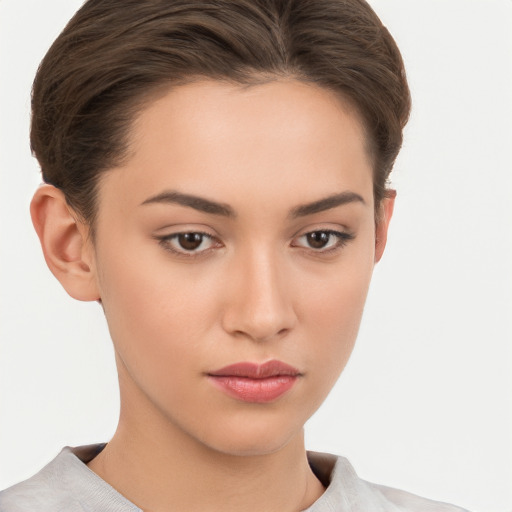 Neutral white young-adult female with short  brown hair and brown eyes