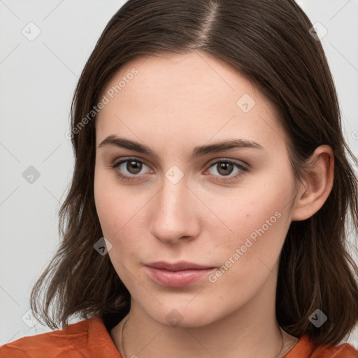 Neutral white young-adult female with medium  brown hair and brown eyes