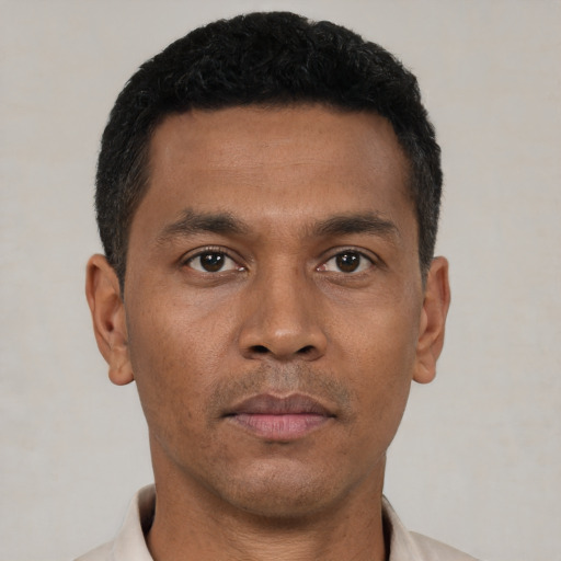 Neutral black young-adult male with short  black hair and brown eyes