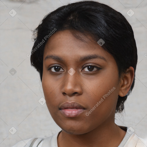 Neutral black young-adult female with short  black hair and brown eyes