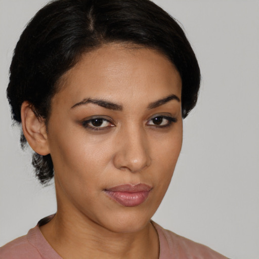 Neutral latino young-adult female with short  black hair and brown eyes
