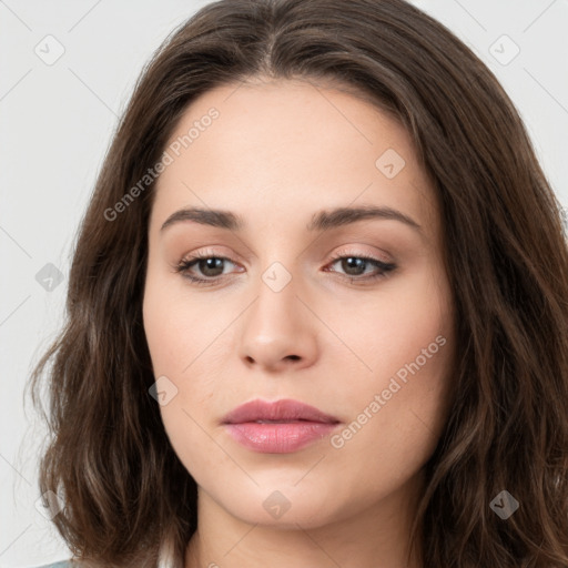 Neutral white young-adult female with long  brown hair and brown eyes