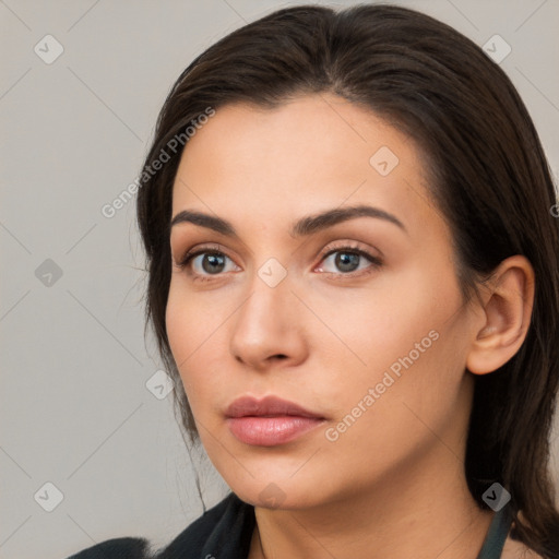 Neutral white young-adult female with medium  brown hair and brown eyes