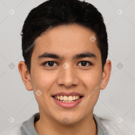 Joyful latino young-adult male with short  brown hair and brown eyes