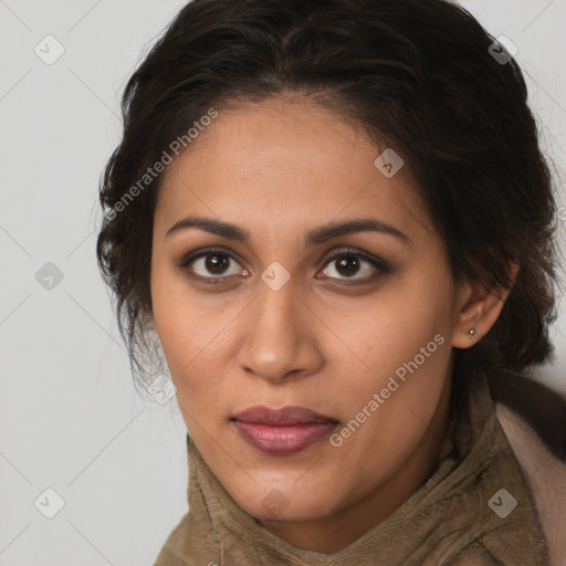 Joyful latino young-adult female with long  brown hair and brown eyes