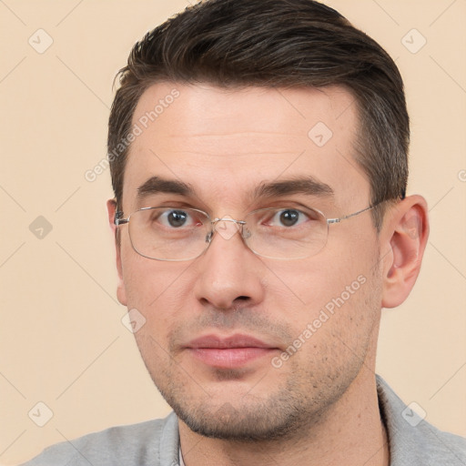 Neutral white adult male with short  brown hair and brown eyes