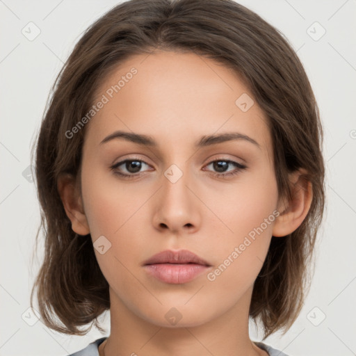 Neutral white young-adult female with medium  brown hair and brown eyes