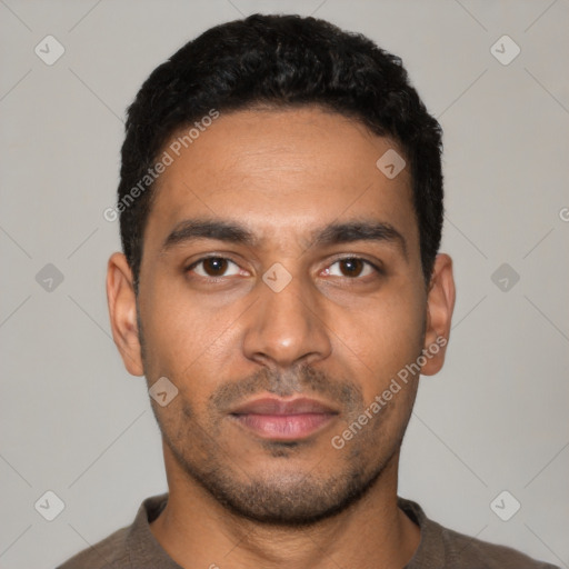 Neutral latino young-adult male with short  black hair and brown eyes