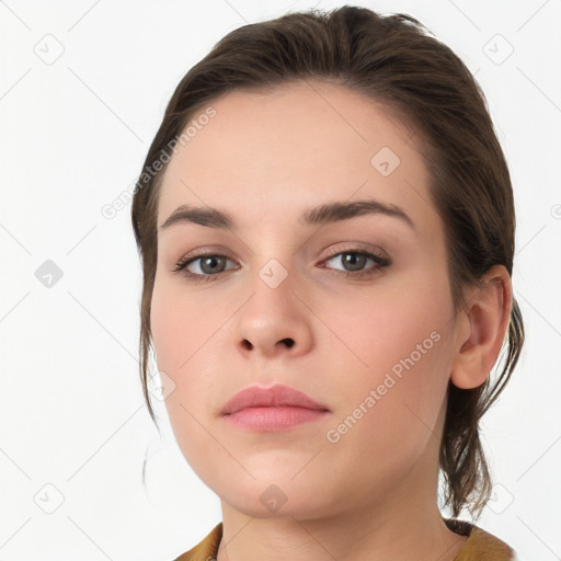 Neutral white young-adult female with medium  brown hair and grey eyes