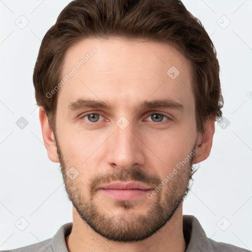 Neutral white young-adult male with short  brown hair and grey eyes