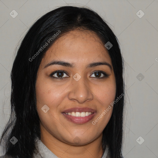 Joyful latino young-adult female with long  brown hair and brown eyes