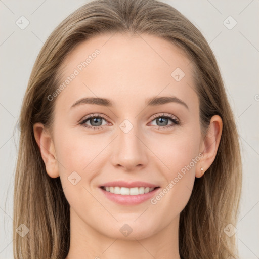 Joyful white young-adult female with long  brown hair and grey eyes