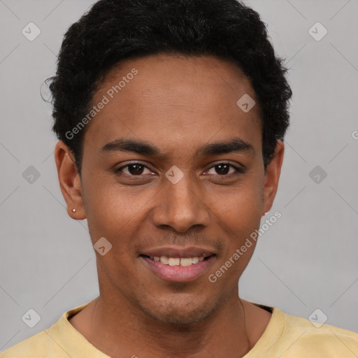 Joyful black young-adult male with short  black hair and brown eyes