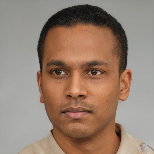 Neutral latino young-adult male with short  black hair and brown eyes