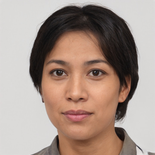 Neutral latino young-adult female with medium  black hair and brown eyes